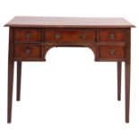 A mahogany and crossbanded writing table