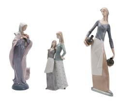 Three Nao, LLadro porcelain figures.