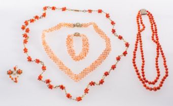 A mixed group of coral jewellery, to include a double strand of coral beads to a foliate clasp,