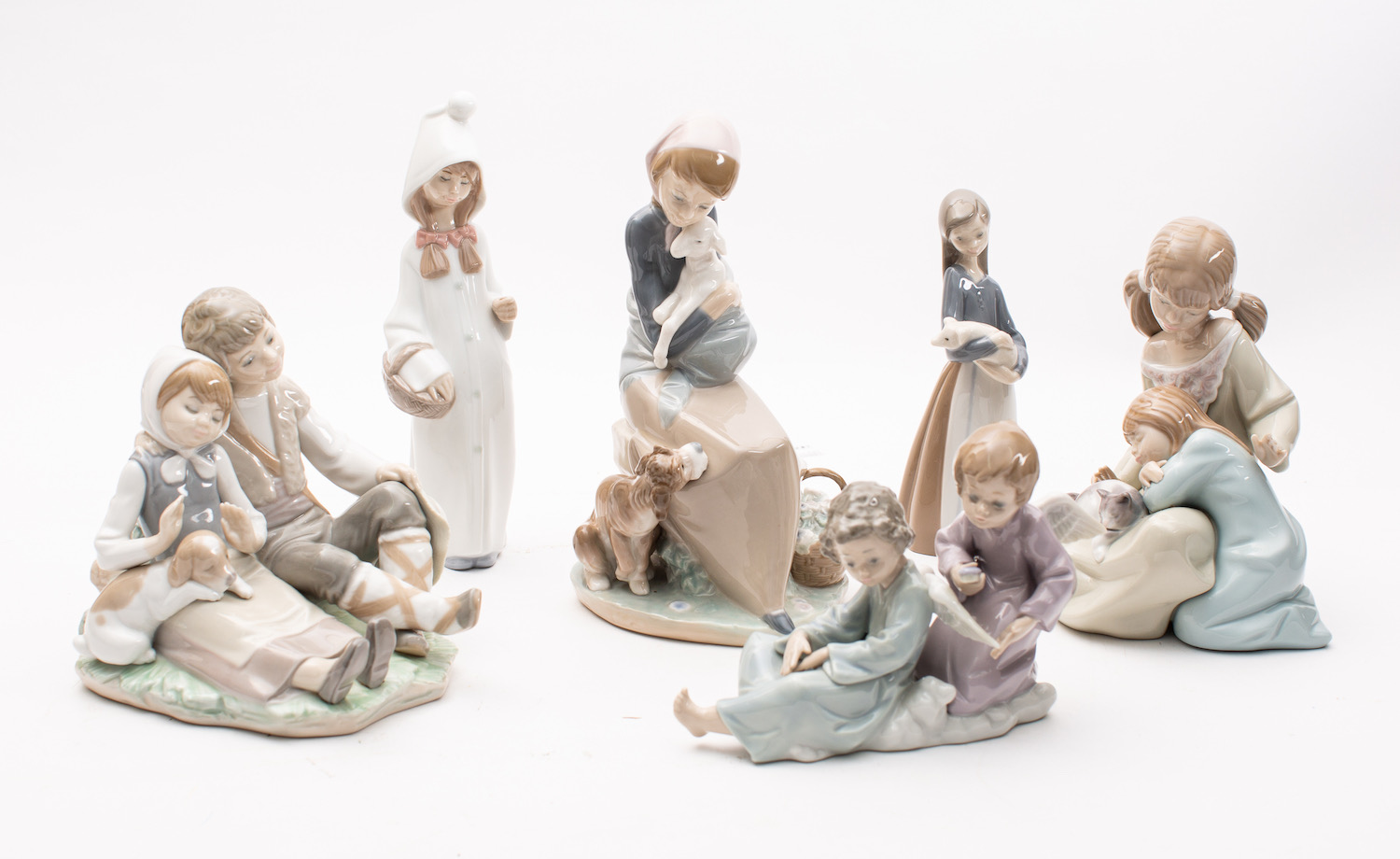 Six various Lladro figure groups, talles