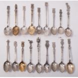 A collection of French and continental teaspoons, mostly souvenir with armorial terminals,