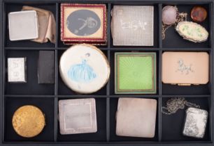 A group of vintage compacts, including a