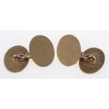 A pair of 9ct yellow gold cufflinks, pla