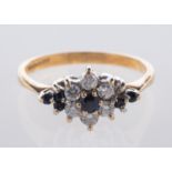 A 9ct yellow gold cluster ring, of flowe