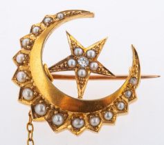 An antique moon & star brooch, set with
