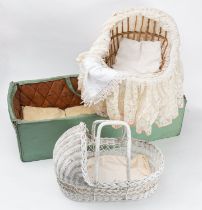 Two wicker doll's beds together with a l