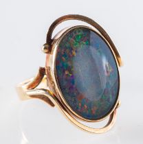 A ring set with an opal triplet with ope