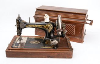 A mahogany cased singer sewing machine