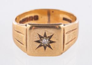 A 9ct yellow gold signet ring, star set