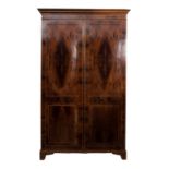 An Edwardian mahogany and inlaid wardrobe, early 20th Century, decorated with boxwood,