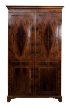 An Edwardian mahogany and inlaid wardrobe, early 20th Century, decorated with boxwood,
