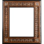 An Arts and Crafts Moorish frame with Mashrabiya turnings and bone inlay. 47 x 41cm, 27 x 20.