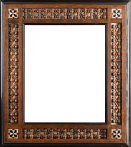 An Arts and Crafts Moorish frame with Mashrabiya turnings and bone inlay. 47 x 41cm, 27 x 20.