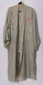 A collection of various textiles, including white ware silk shawl, two silk dressing gowns etc.