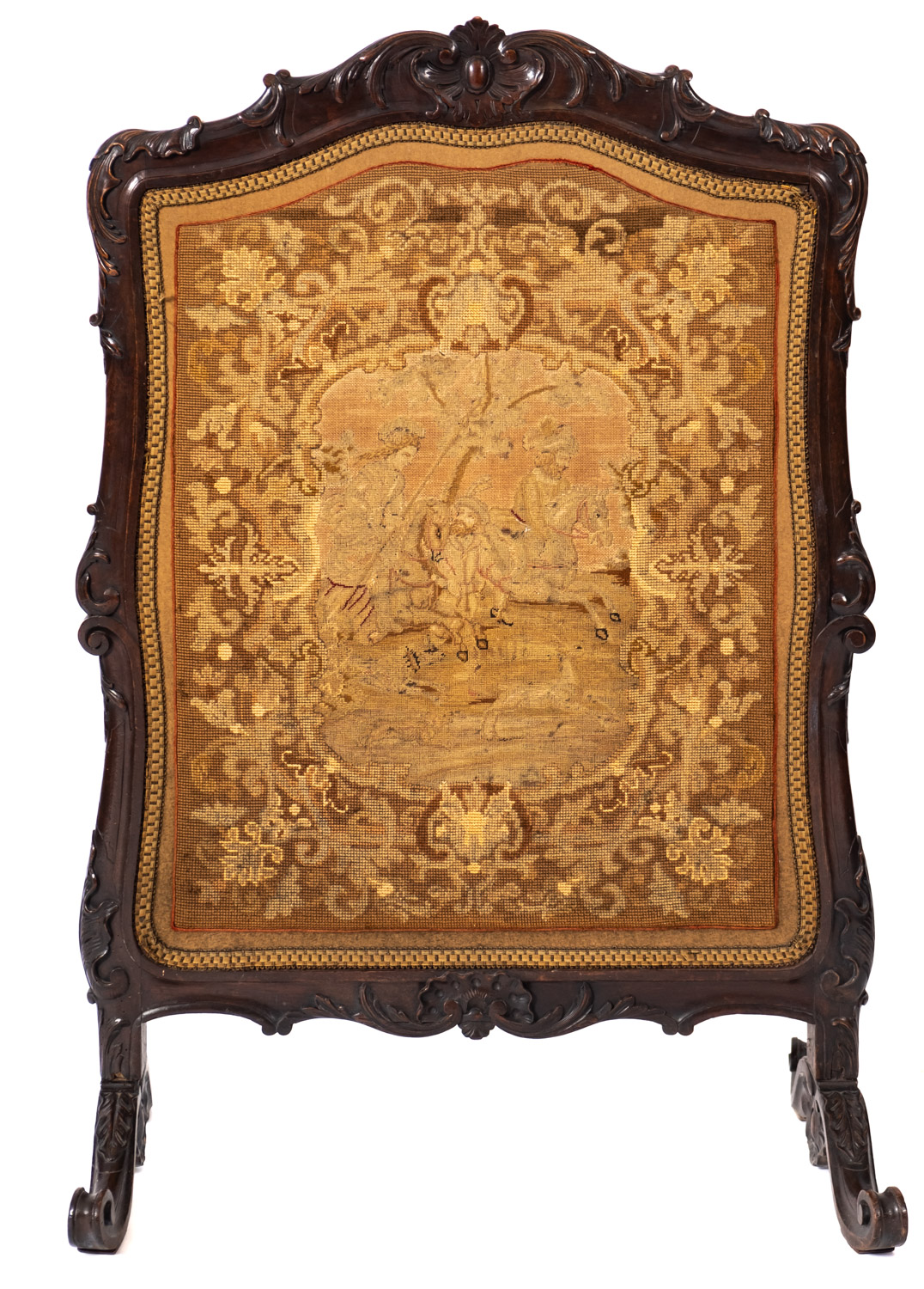 A Victorian carved walnut and Berlin woolwork firescreen, mid 19th Century,