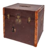 A canvas covered and leather bound square travelling box with brass lock and hinges,
