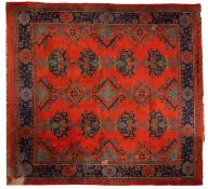 A Turkey carpet with traditional design and colours,