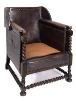 A leather covered and brass studded armchair in the 17th Century taste, circa 1920,