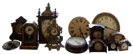 An Edwardian wall clock in a stained wood case with turned half columns, 51cm high,