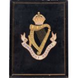 An early 20th century needlework Regimental crest 'The Queen's', 28cm x 34cm,