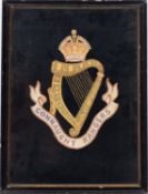 An early 20th century needlework Regimental crest 'The Queen's', 28cm x 34cm,