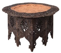 An Anglo Indian carved and stained hardwood and metal inset occasional table, circa 1900,