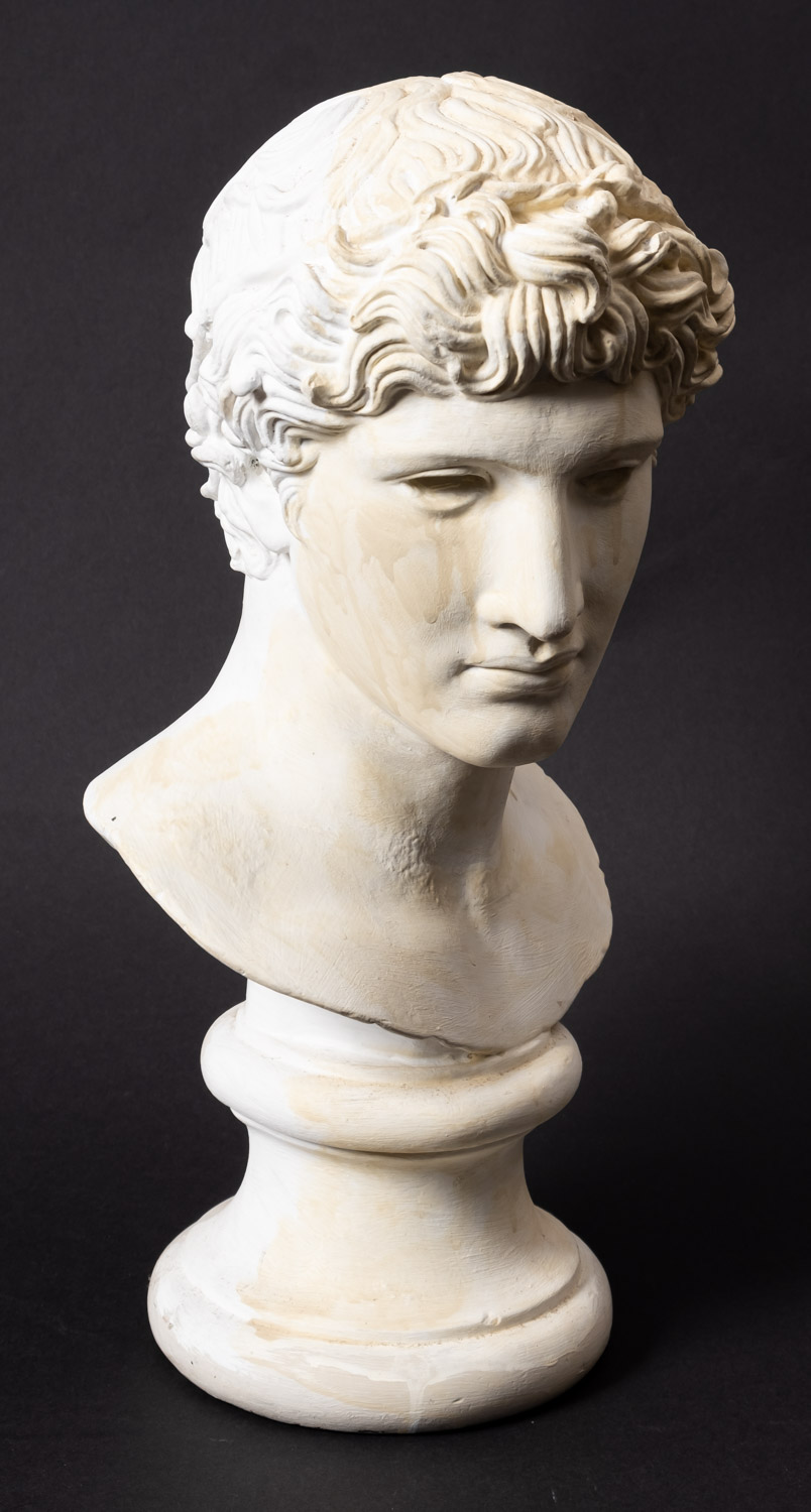 A plaster bust of an athlete, modelled after the Antique, possibly by Brucciani,