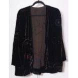 A collection of various textiles, including a black velvet jacket, whiteware etc.