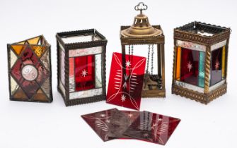 A late Victorian brass and leaded glass square hall lantern with red,