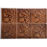 A set of six Minton's brown glazed pottery square tiles,