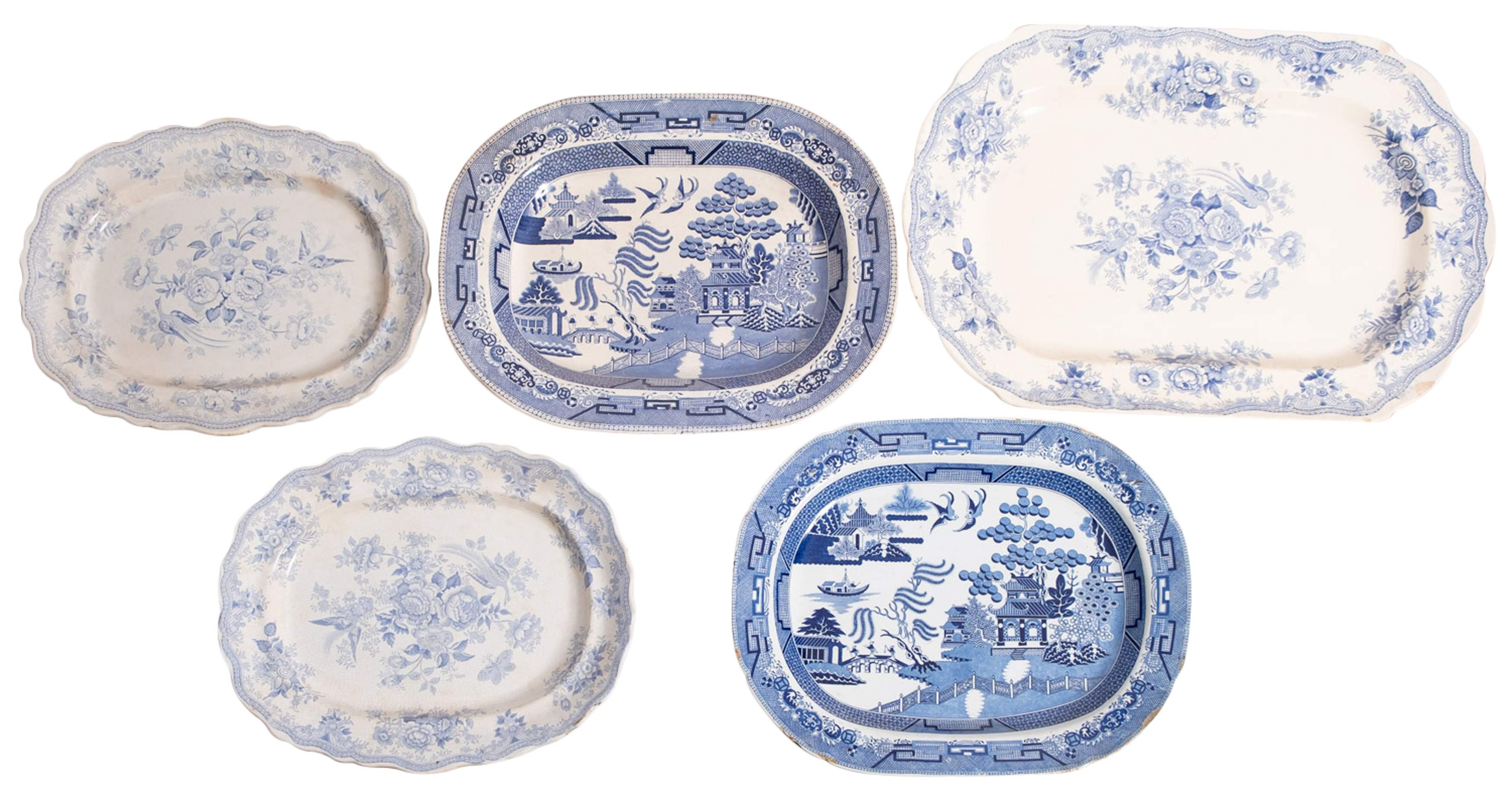 A pair of Staffordshire pottery blue and white transfer decorated meat plates with the asiatic