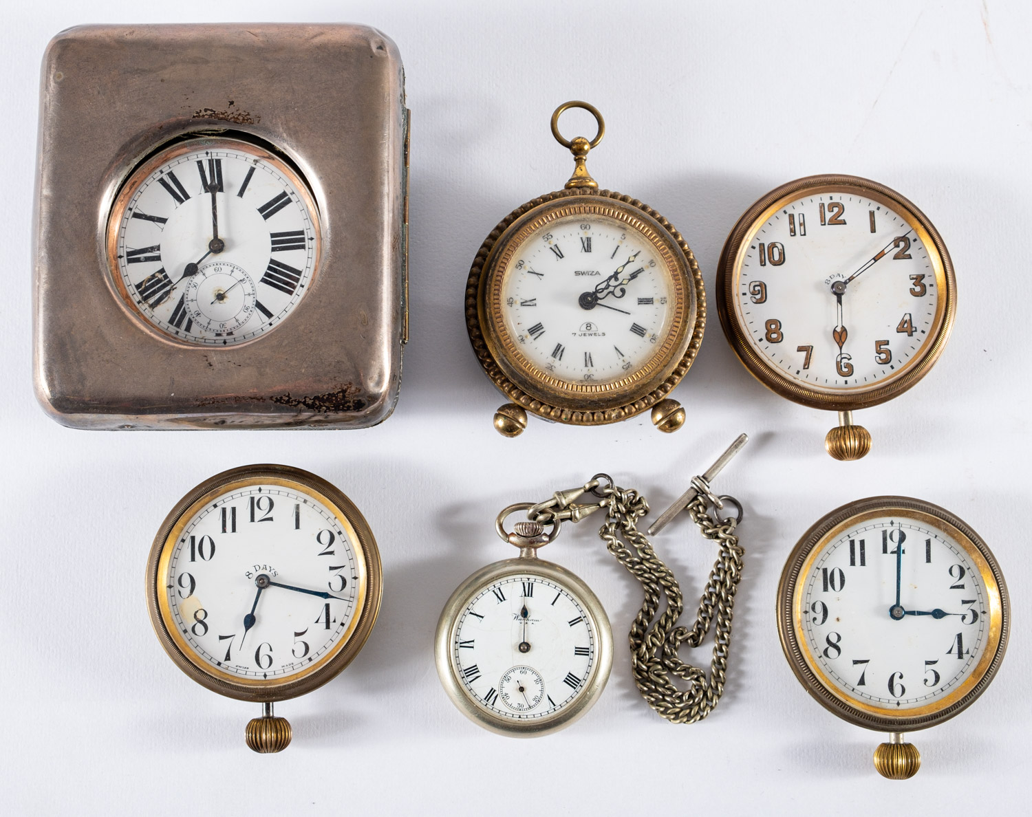 A silver cased bedside watch case, Birmingham 1904, containing a plated watch,