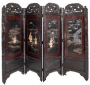 A Japanese carved ebonised wood and shibayama four-fold room screen, circa 1900,