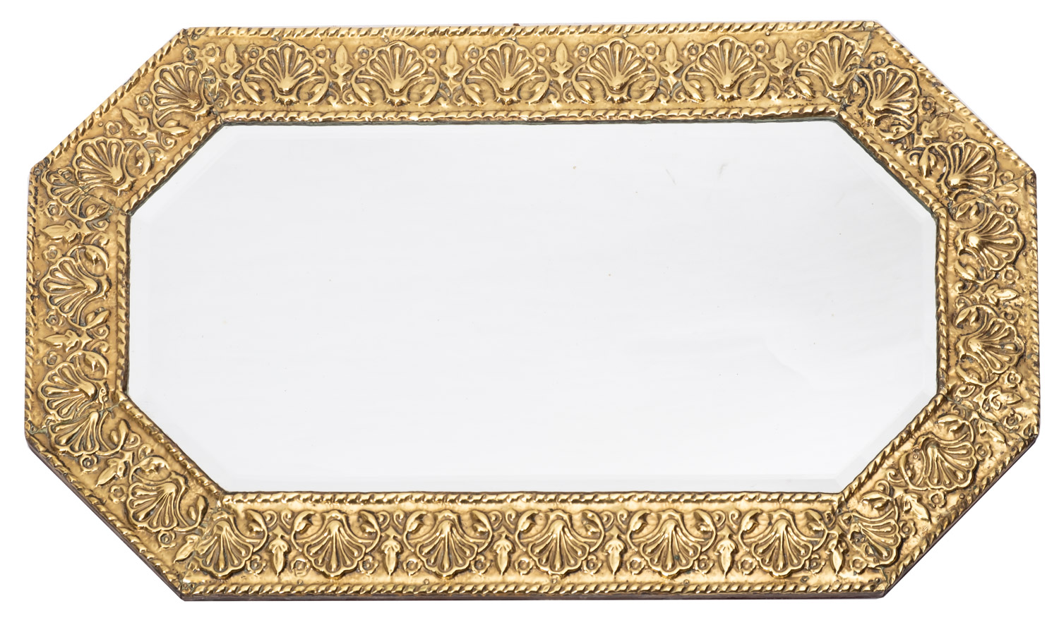 A Victorian repousse brass framed octagonal wall mirror,