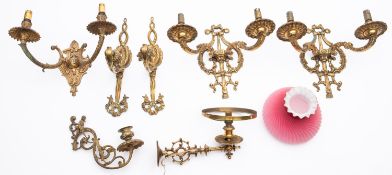 A pair of cast brass twin light applique with foliate scroll decoration, 31cm across,