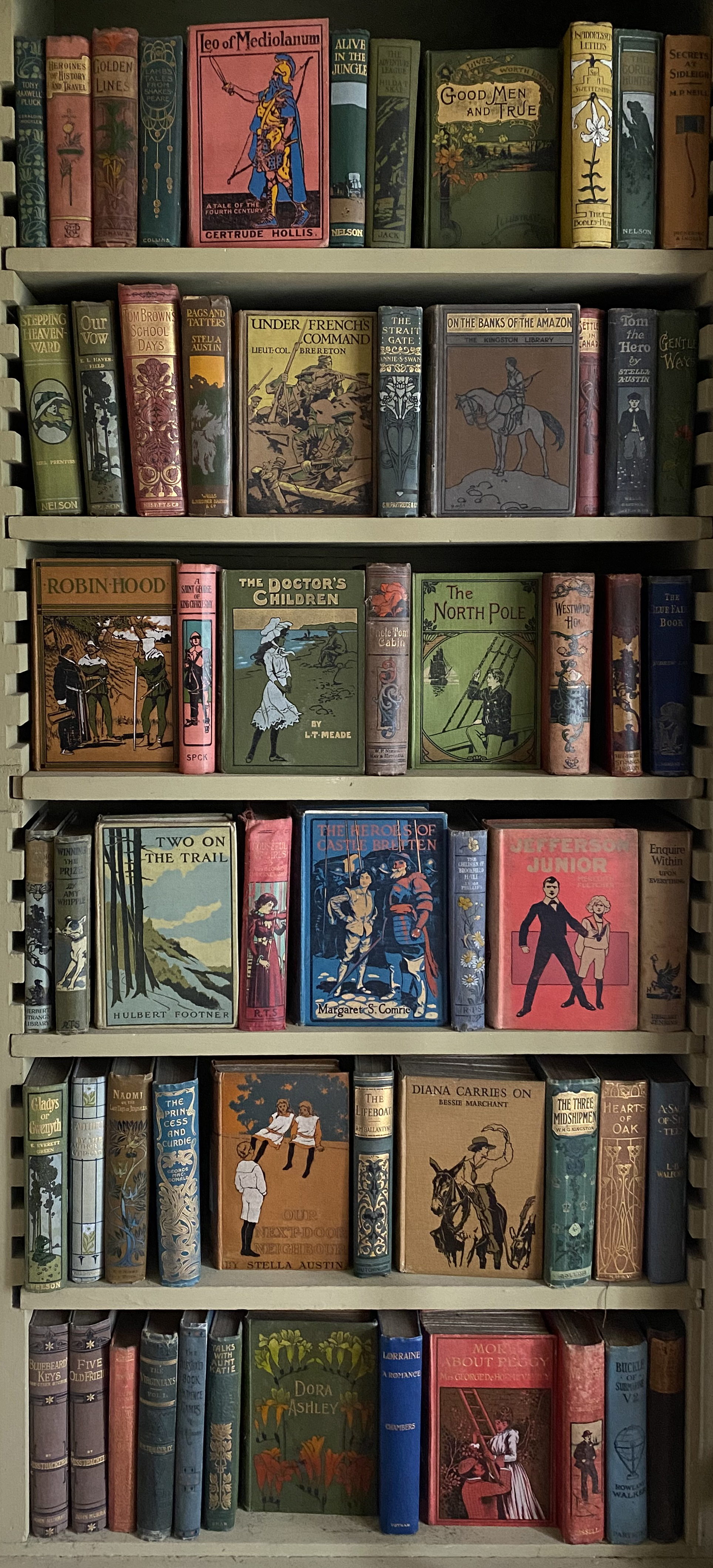 A large quantity of various Edwardian and later books with illustrated bindings,
