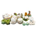 A collection of mainly green glazed pottery items including a set of six vine leaf pattern dessert