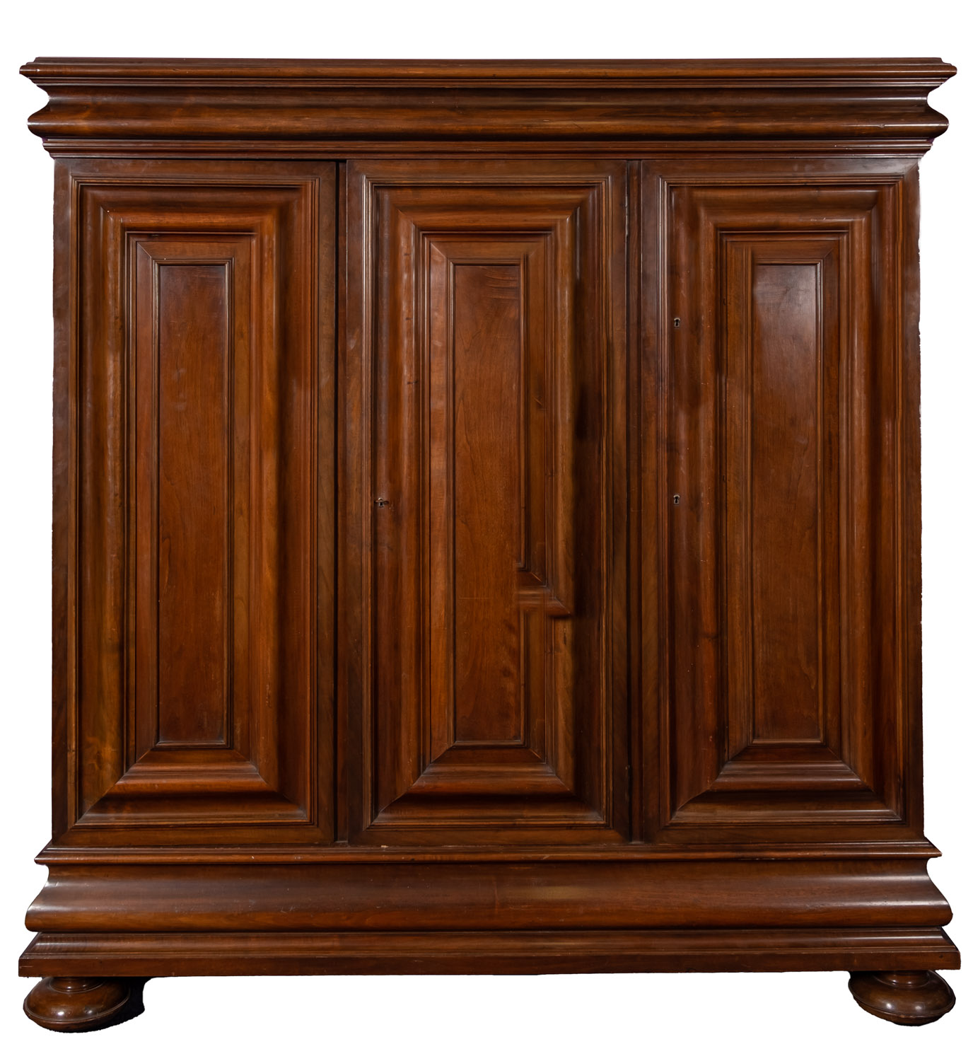 A walnut Hallenschrank, late 19th Century, in 17th Century style, with moulded ogee corners,