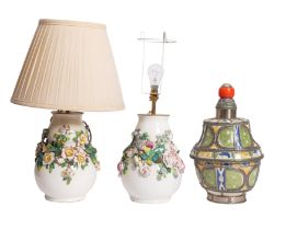 A pair of glazed pottery double gourd shaped vase lamps, encrusted with flowers and foliage,