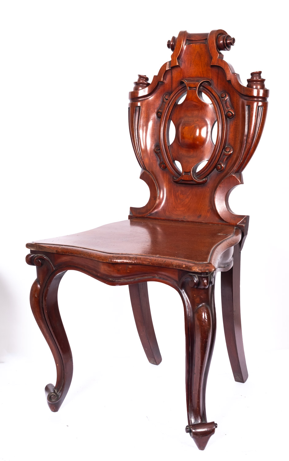 A Victorian carved mahogany hall chair,