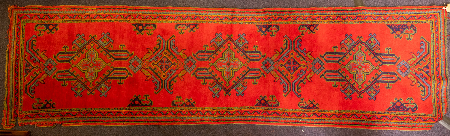 A Turkey rug of traditional design and colours, 244cm x 156cm, also a Turkey runner, 350cm x 93cm,