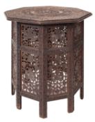An Anglo Indian carved and stained hardwood octagonal occasional table, circa 1900,