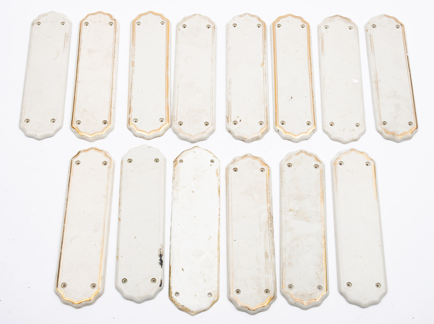 Seven pairs of porcelain finger plates, 18cm long.