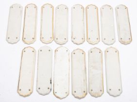 Seven pairs of porcelain finger plates, 18cm long.