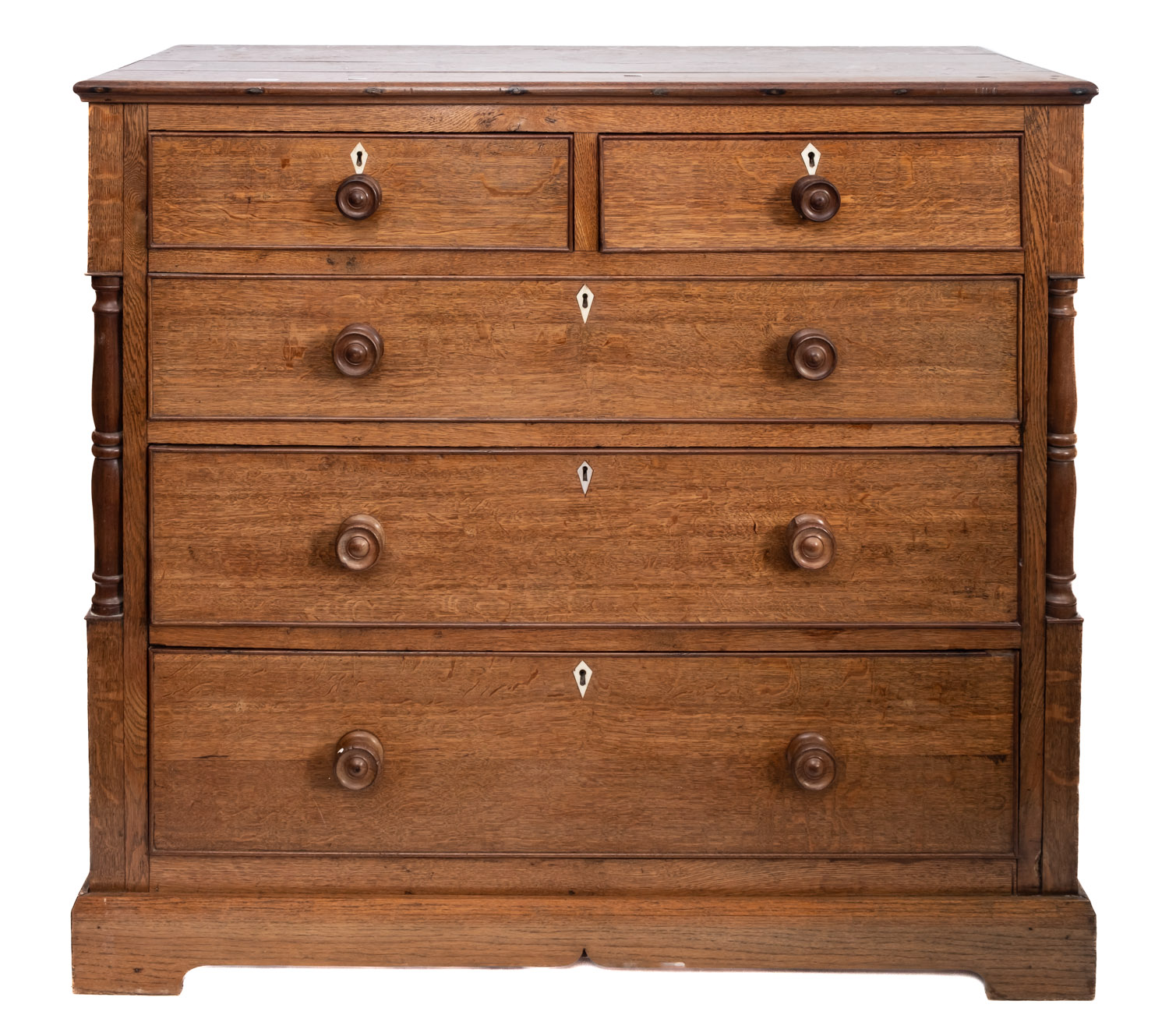 An early 19th Century oak rectangular chest containing two short and three long drawers between