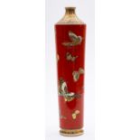 A Satsuma pottery vase of tapering cylindrical form, the iron red body enamelled with butterflies,