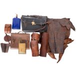 A collection of assorted leather items, late 19th and early 20th century; including two briefcases,