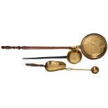 A copper and brass warming pan, together with a brass skillet pan, a brass ladle,