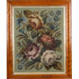 A Victorian gros point needlework picture, depicting a bouquet of floral foliage,