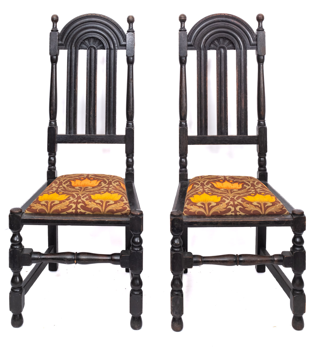 A pair of carved oak side chairs in Charles II style, circa 1900,